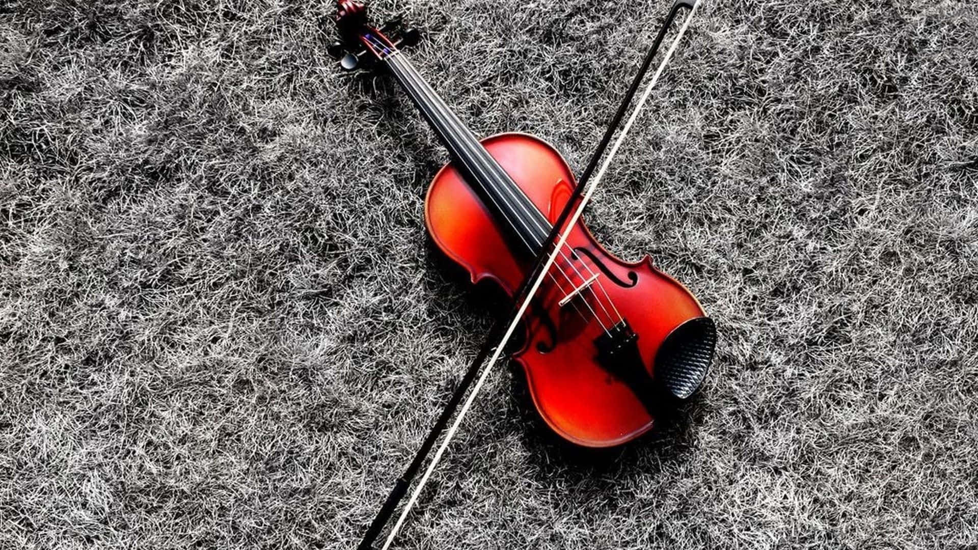 Enbild På En Violinist Som Spelar Sitt Instrument. Wallpaper