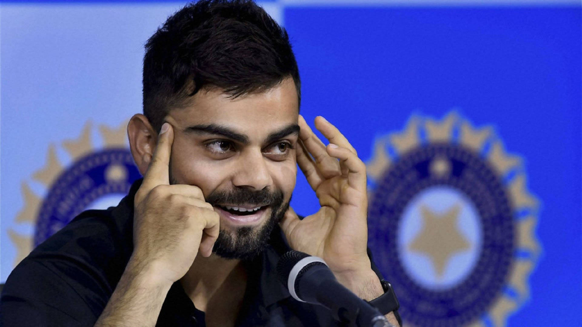 Viratkohli Interview. (there Is No Additional Context Provided To Translate This Sentence. However, If You Are Looking For A Translation Related To Computer Or Mobile Wallpaper, Please Provide More Specific Information So That I Can Assist You With An Accurate Translation.) Wallpaper
