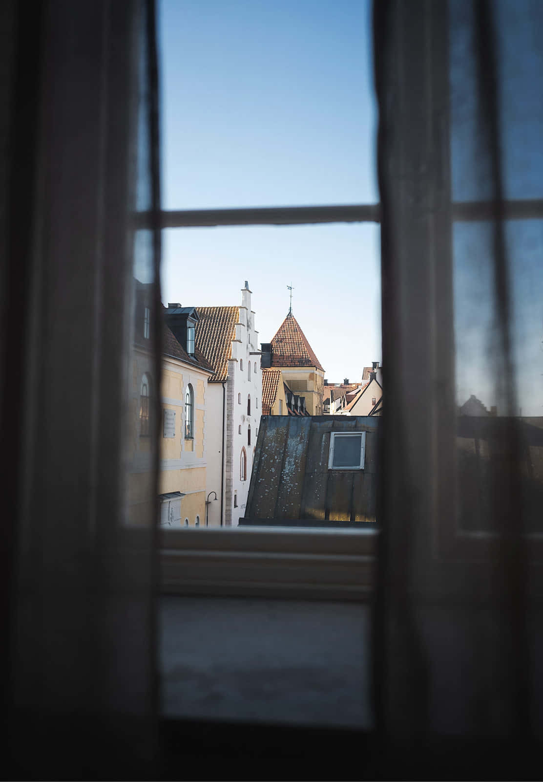 Visby_ View_through_ Window Wallpaper