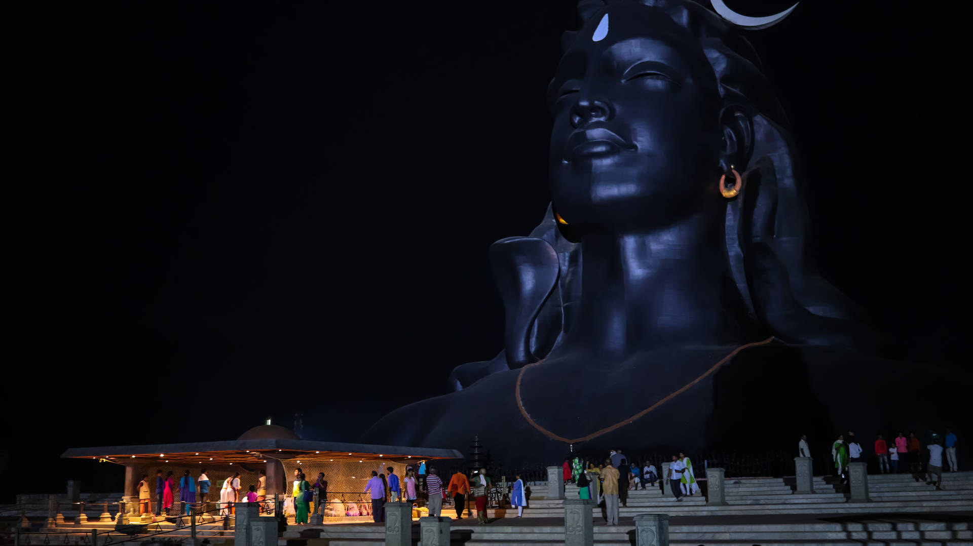Download Visitors Of Adiyogi Shiva Statue Nighttime Wallpaper | Wallpapers .com