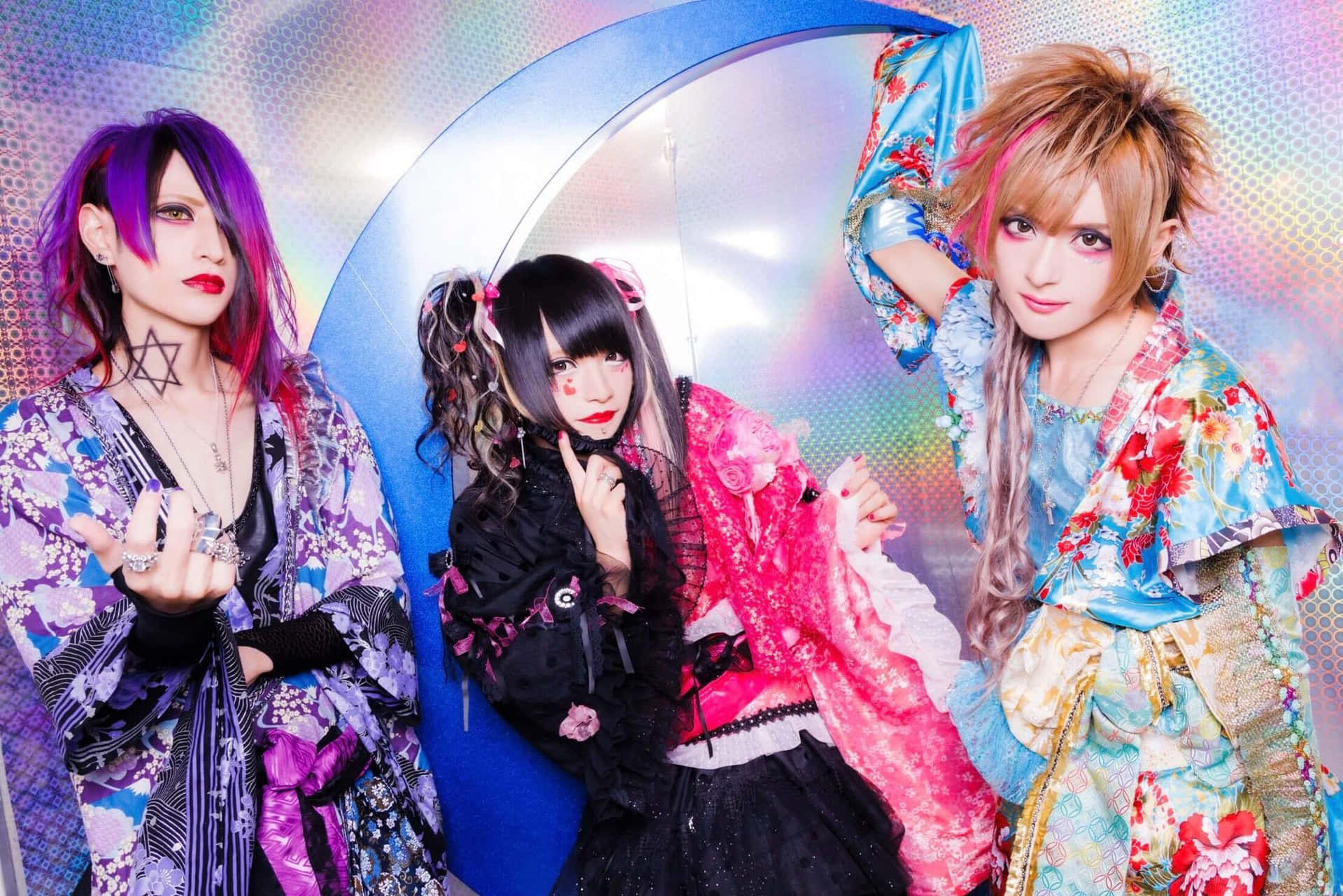 Stylish Visual Kei band performing on stage Wallpaper