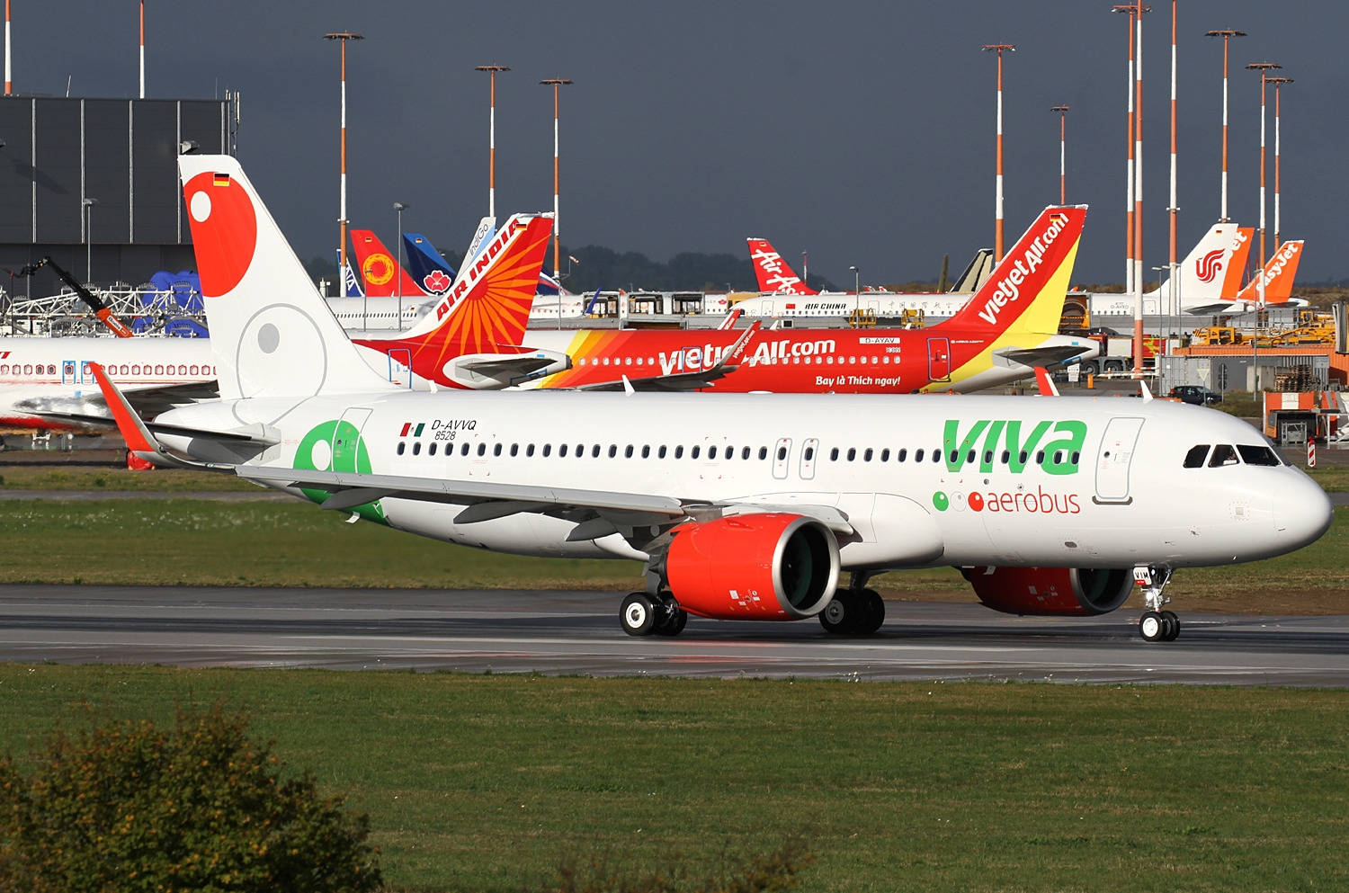 Viva Aerobus Among Other Airplanes At Airport Wallpaper