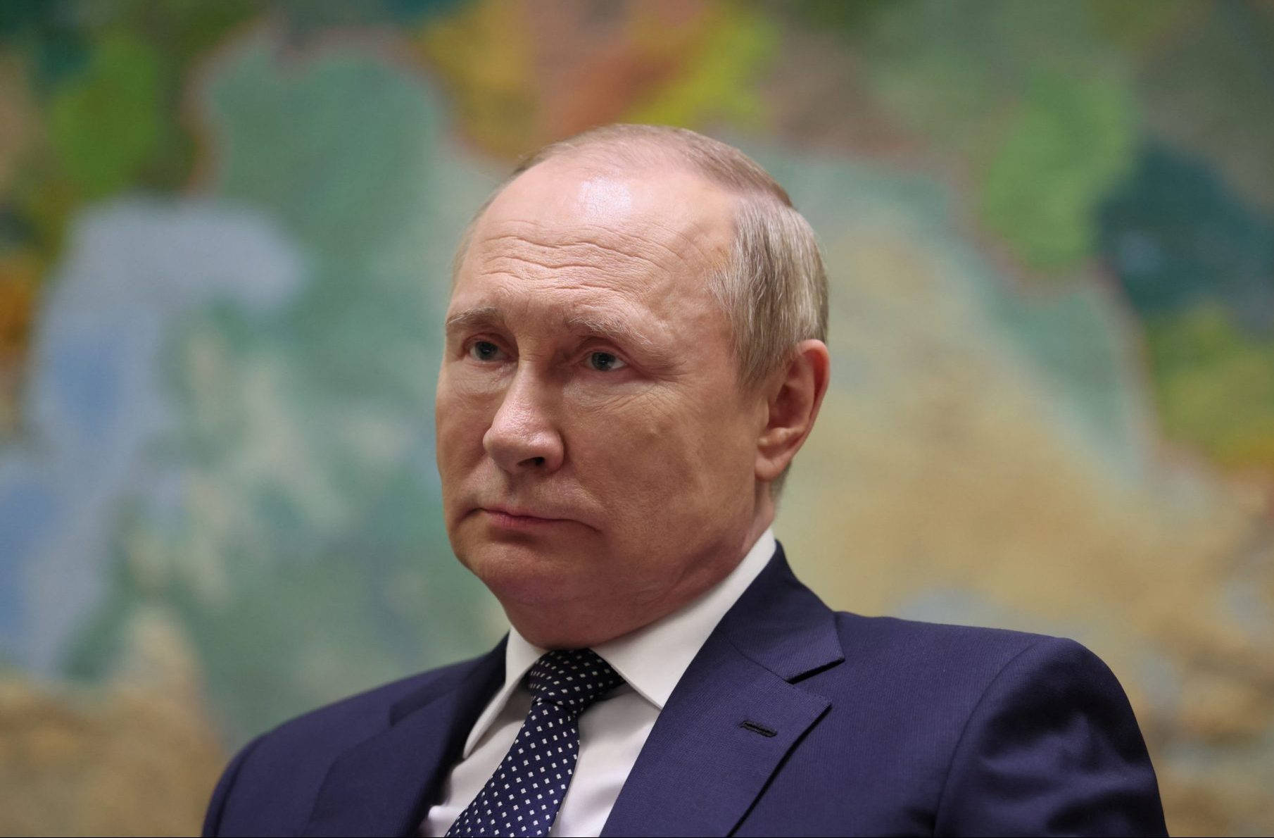 Vladimir Putin Against Blurry Abstract Backdrop Wallpaper