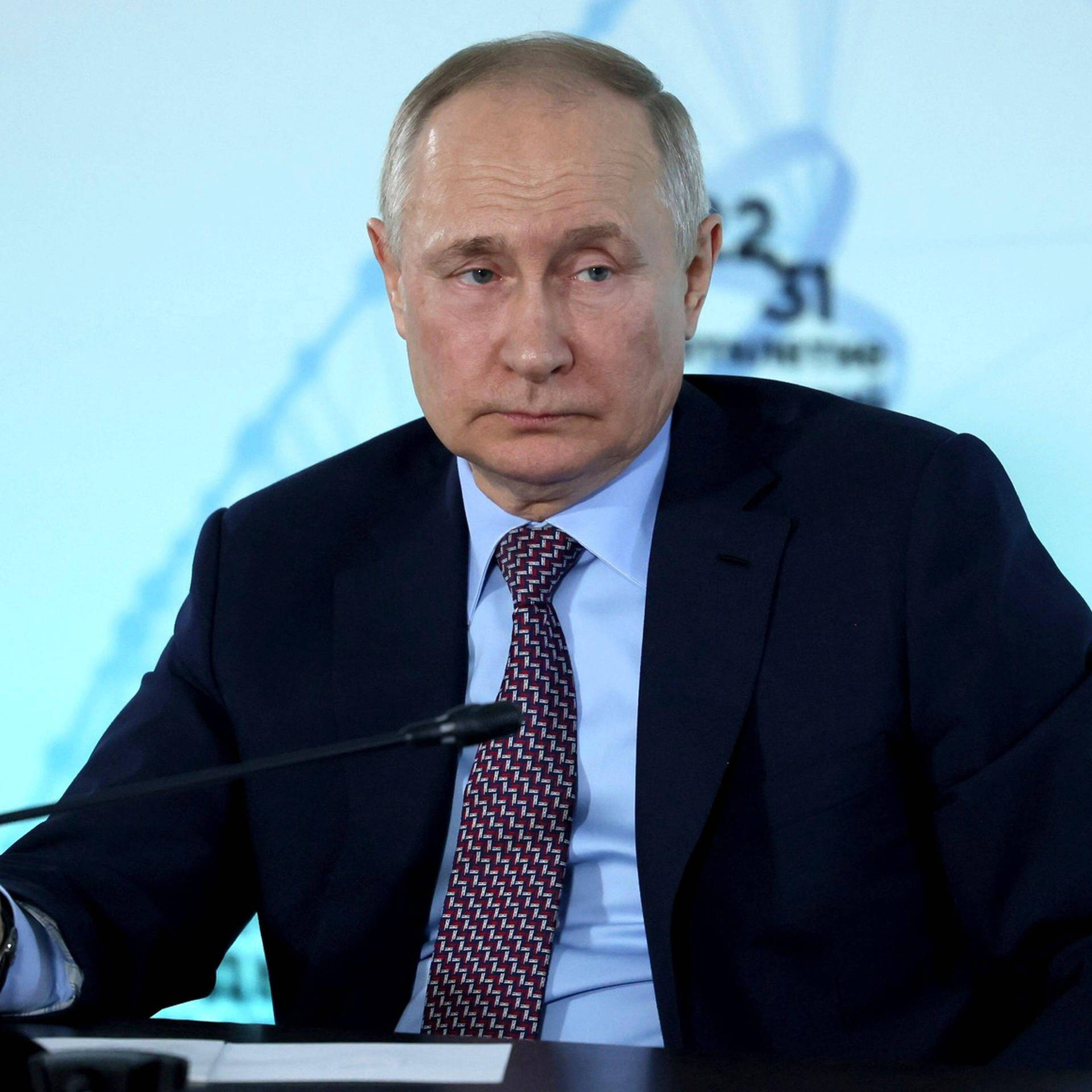 Vladimir Putin Against Light Blue Backdrop Wallpaper