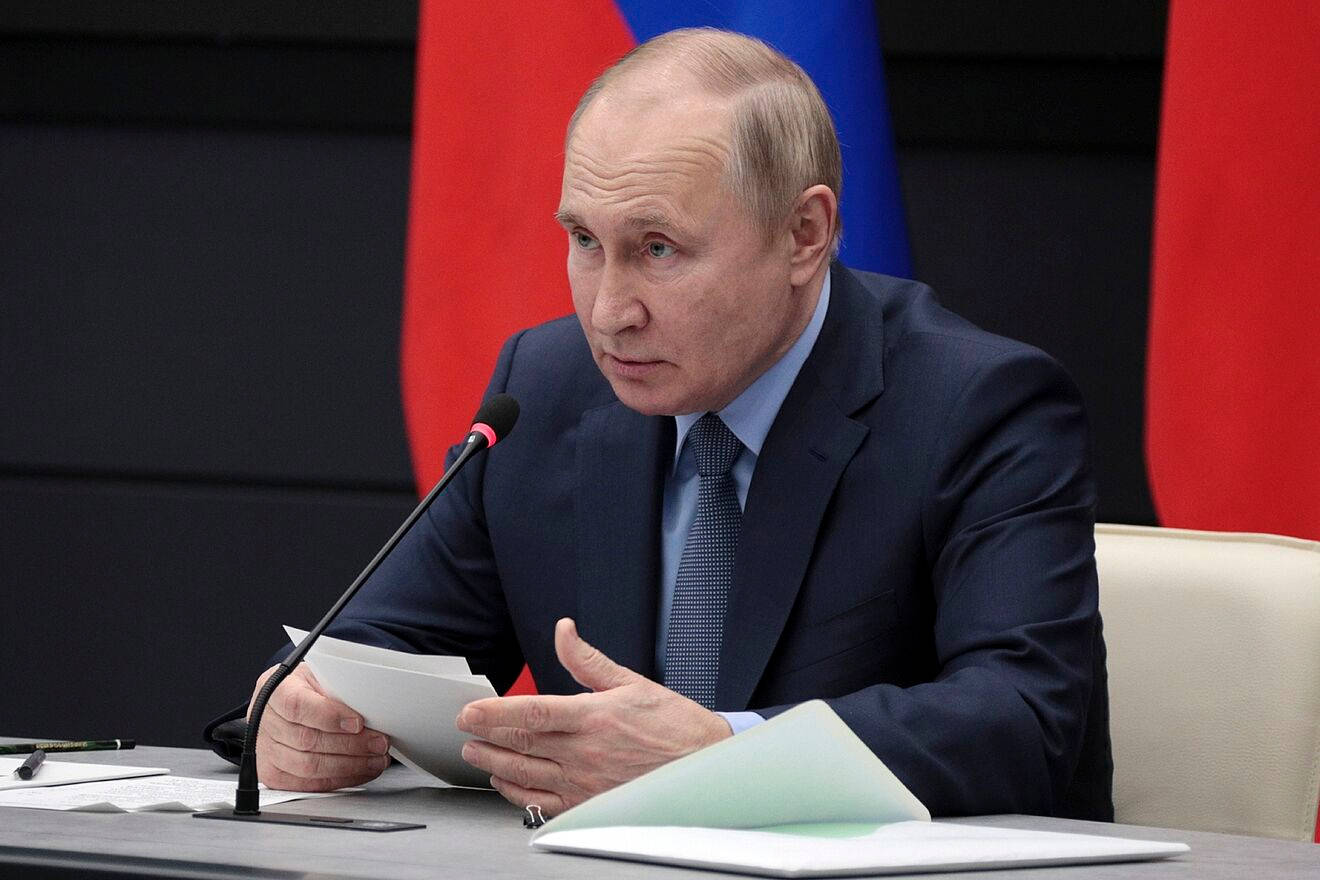 Vladimir Putin Holding Papers During Speech Wallpaper