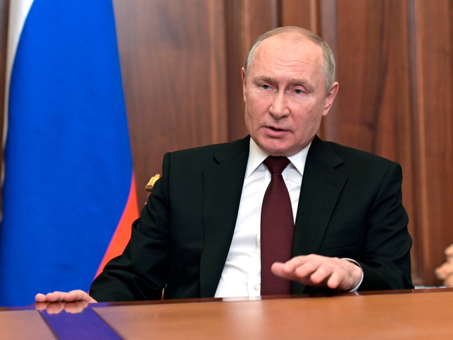 Vladimir Putin Speaking At Conference Table Wallpaper