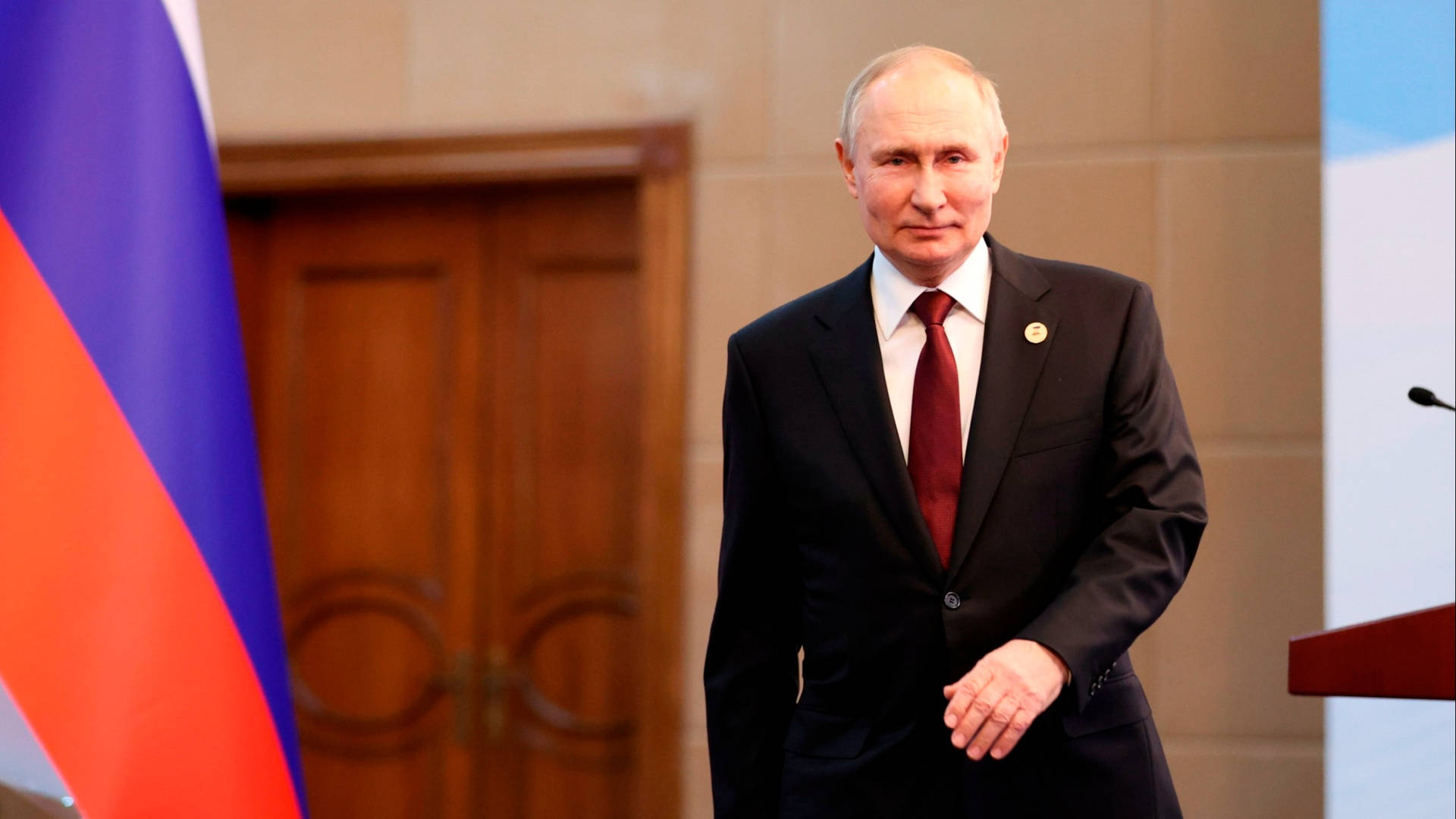 Vladimir Putin Walking Away From Podium Wallpaper