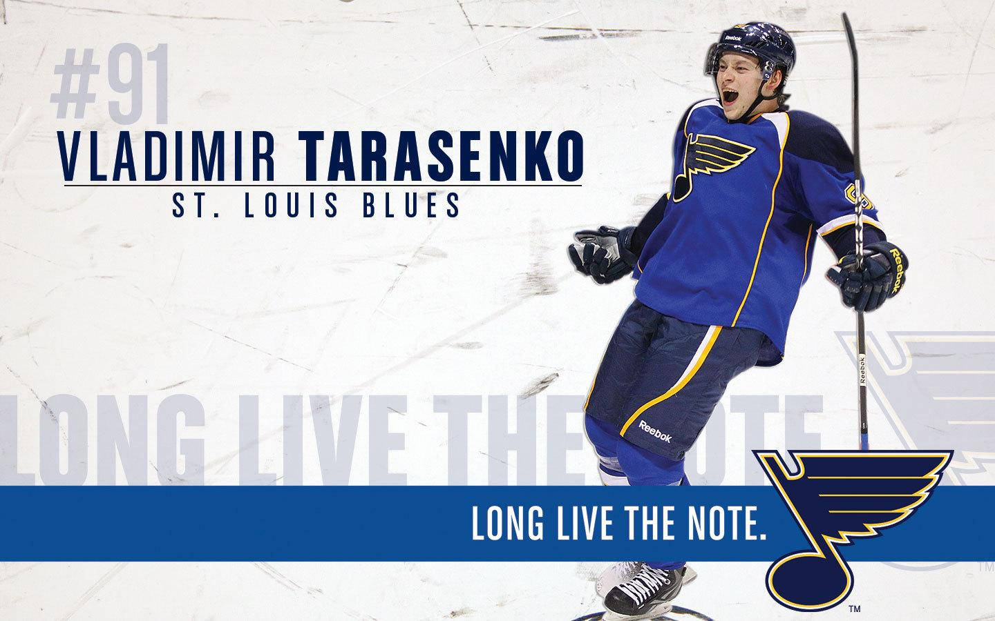 Vladimir Tarasenko Shouting Expression While Holding Hockey Stick With Team Quote Wallpaper