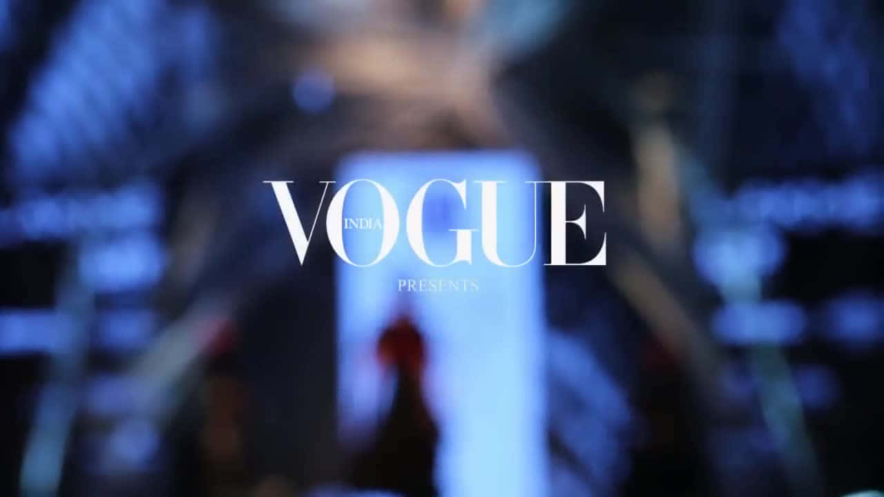 Vogue Logo Against A Black Background Wallpaper