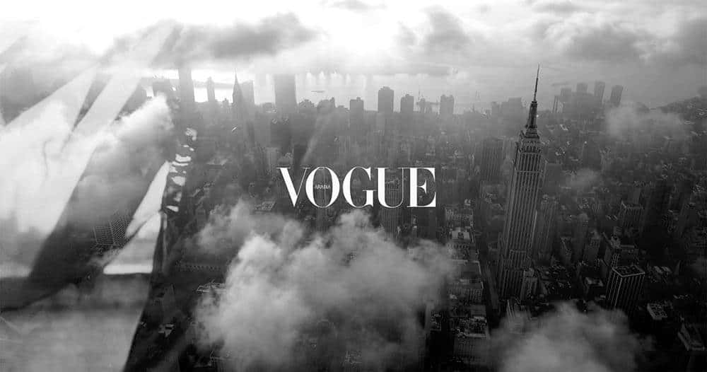 Vogue Logo Over Cityscape Wallpaper