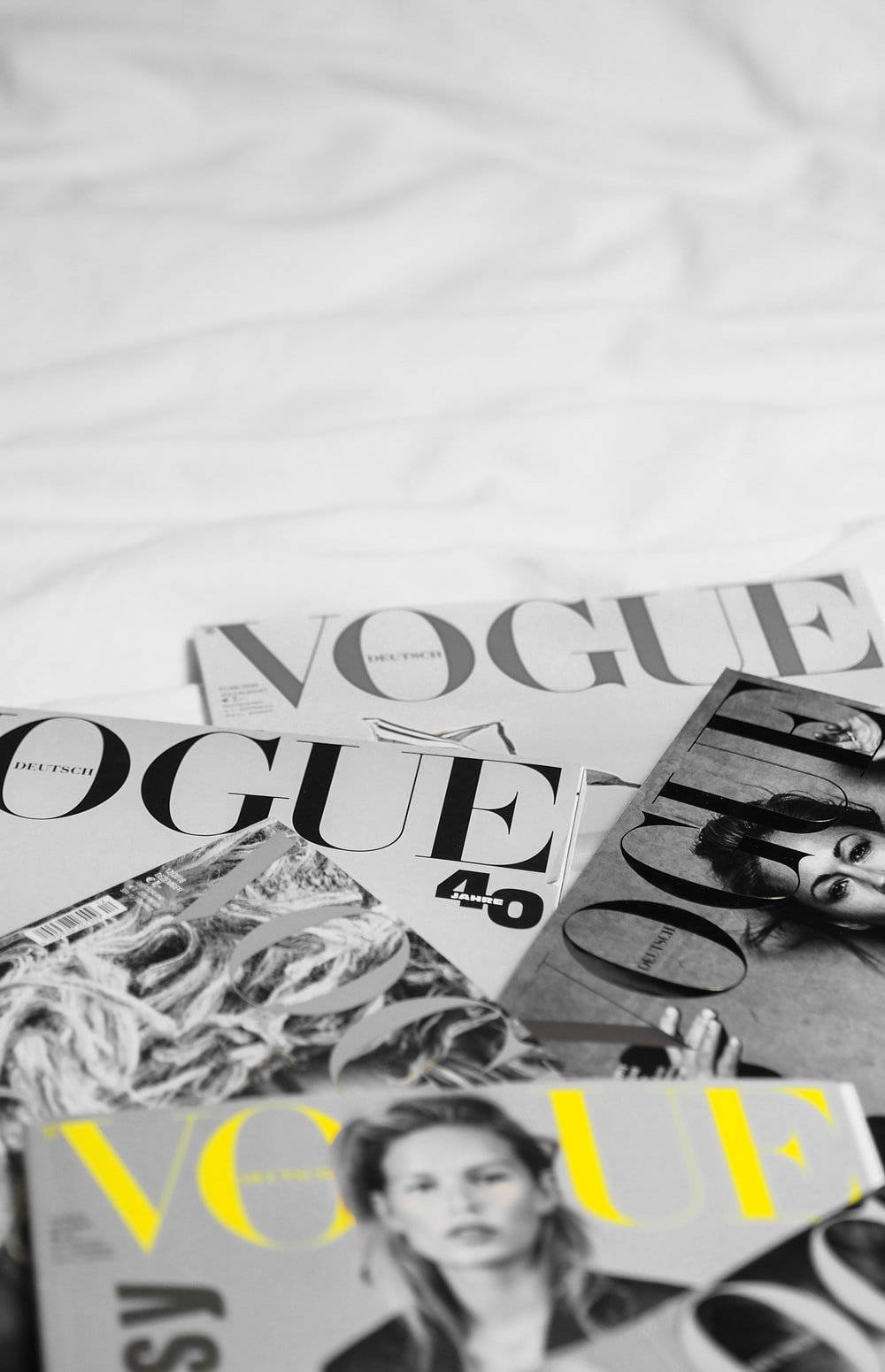 Vogue Magazine Covers In A Bed Wallpaper