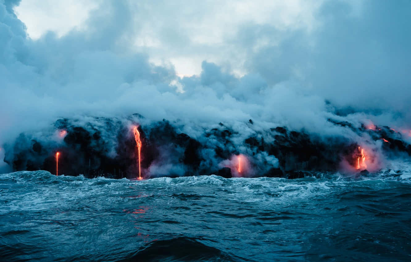 Volcanic Eruption Meets Ocean Waves Wallpaper