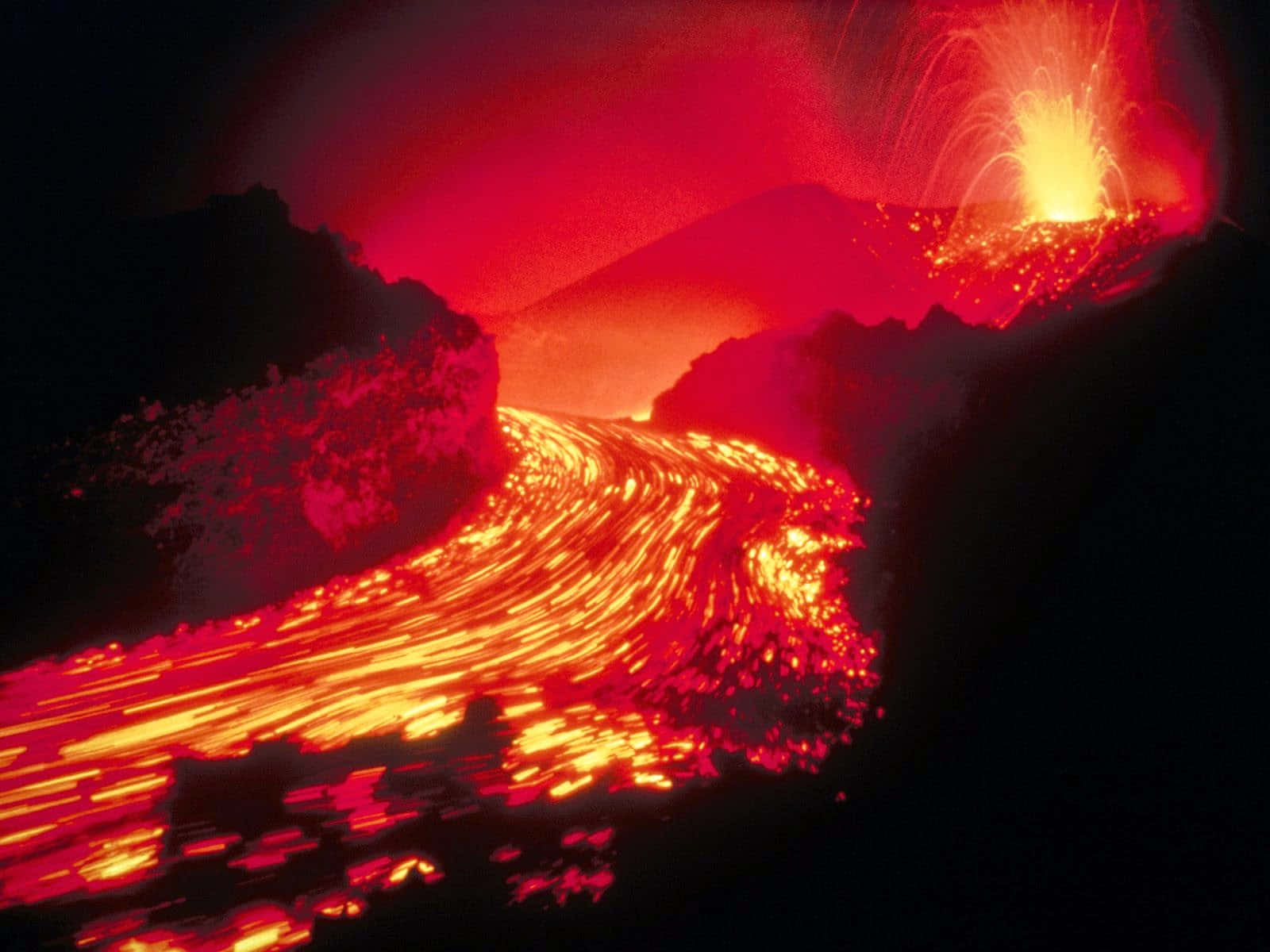 A Lava Flow With Red And Orange Light