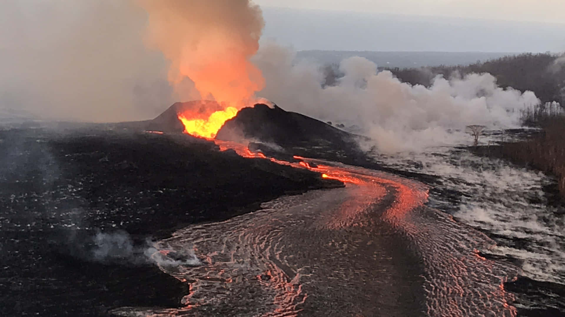 A Lava Flow Is Coming Out Of The Ground