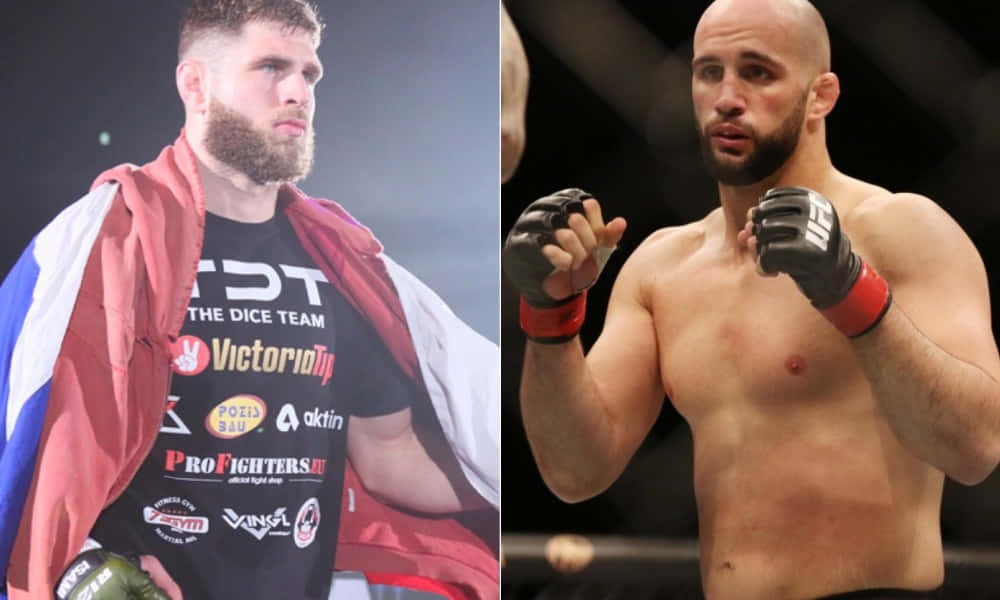 Volkan Oezdemir Delivering A Punch During An Mma Fight Wallpaper