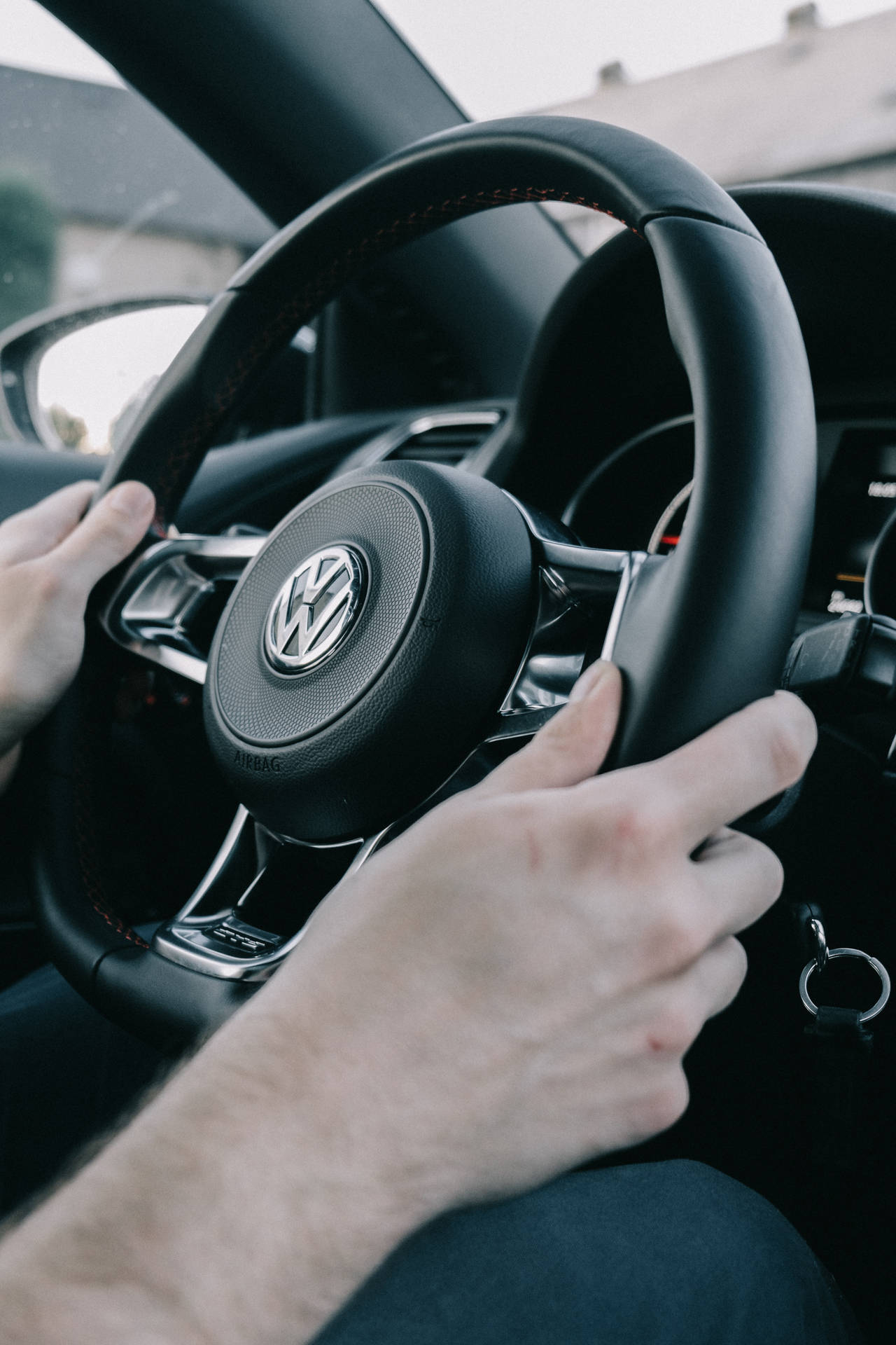 Find a harmony of your hands and the Volkswagen wheel Wallpaper