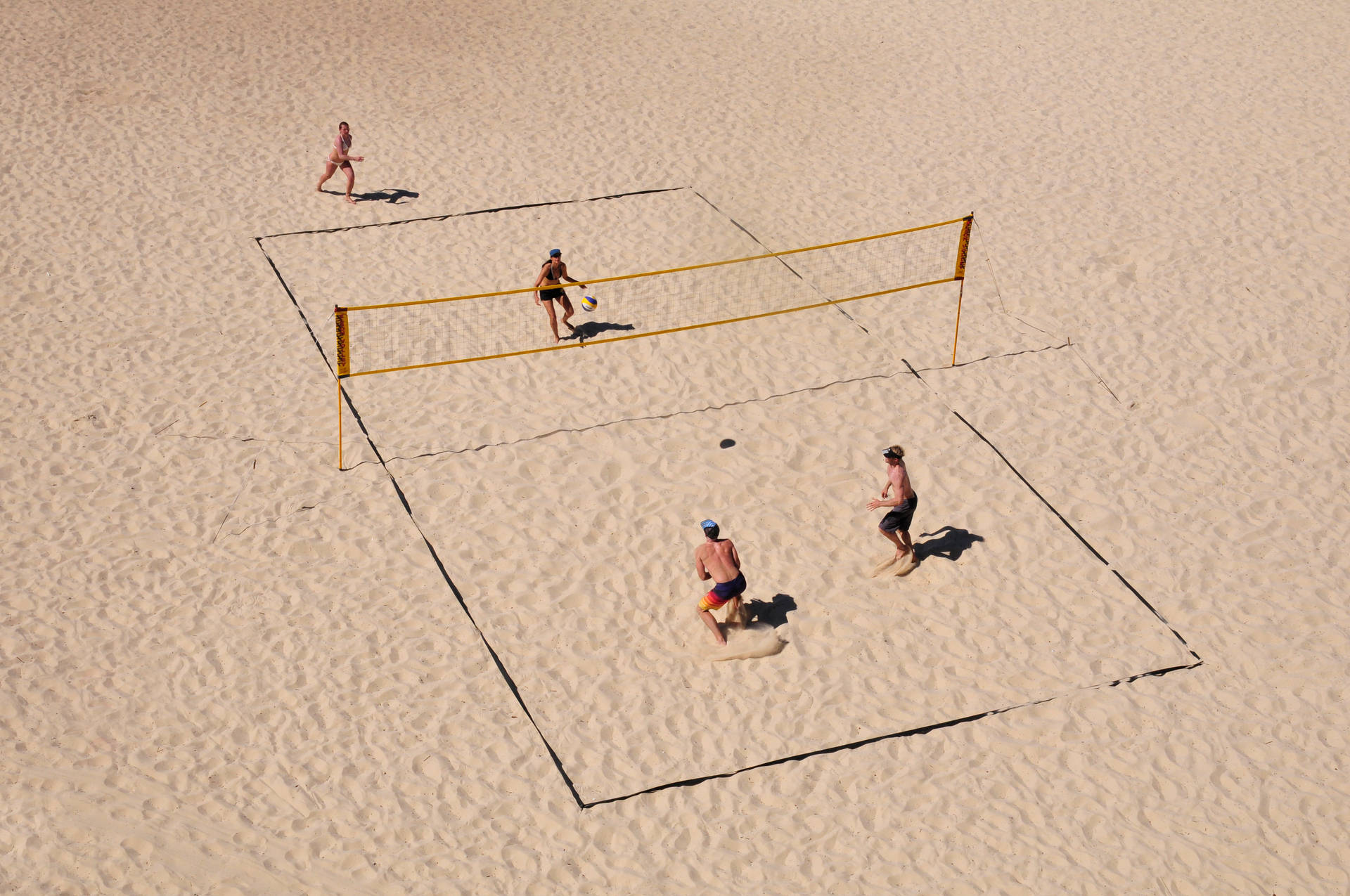 Volleyball Hold På Stranden Wallpaper