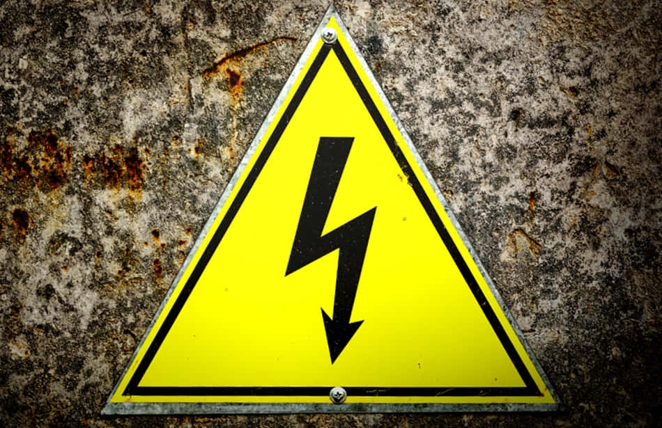 High Voltage Sign On Dirty Wall Picture