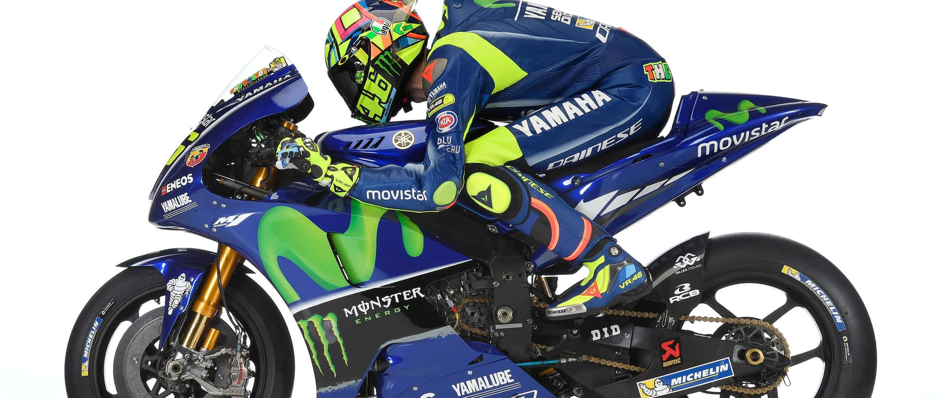 A thrilling ride with the VR46 Yamaha Monster Energy Motorcycle Wallpaper