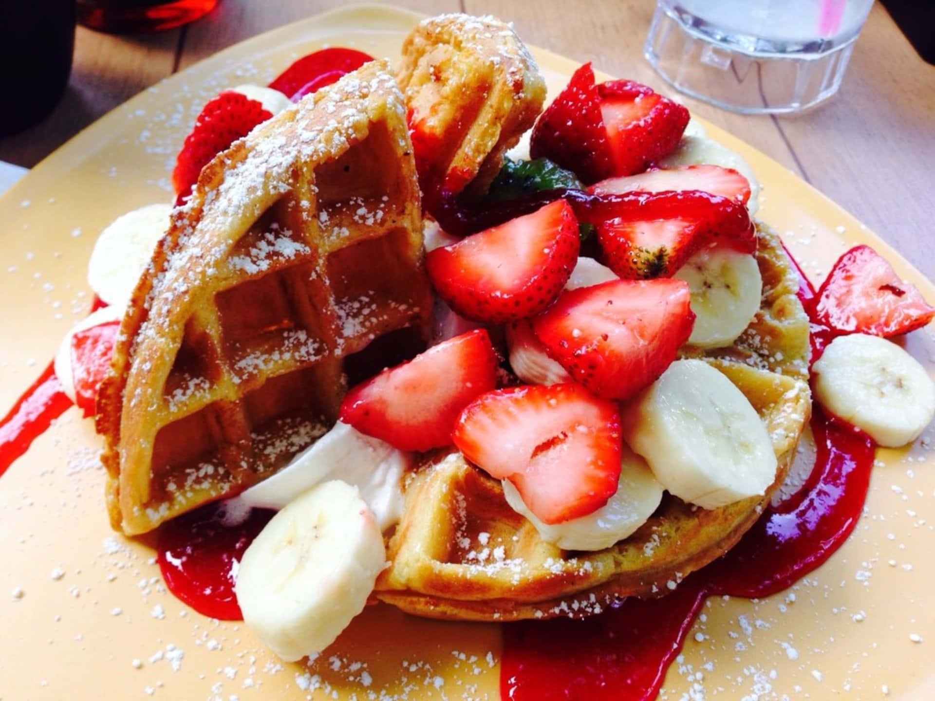 Enjoy a delicious golden-brown waffle topped with cocoa or hazelnut spread.