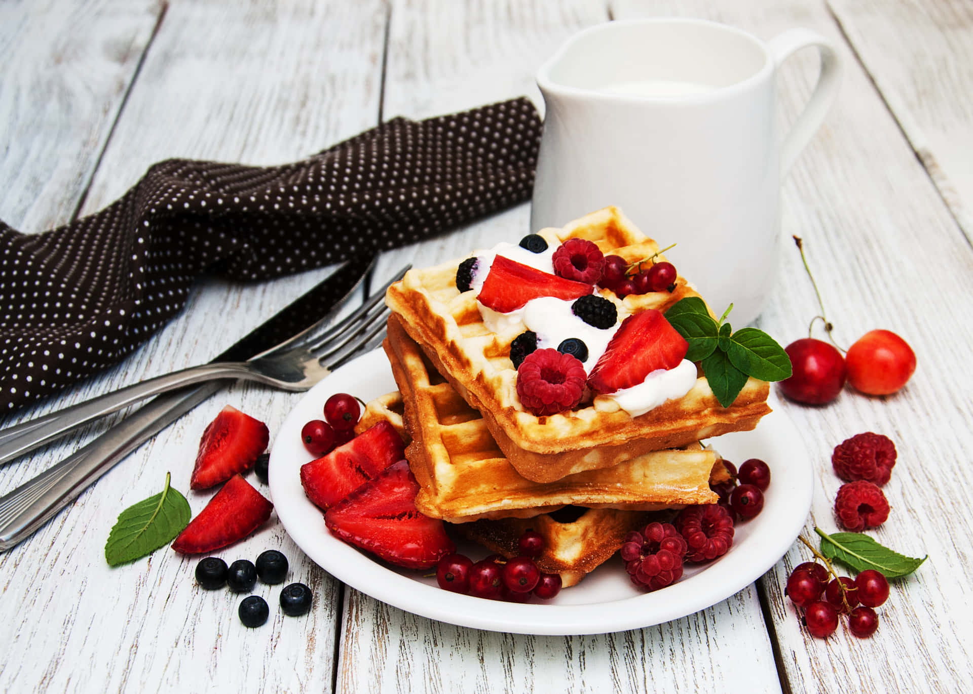 Delicious and crispy waffles stacked on a plate