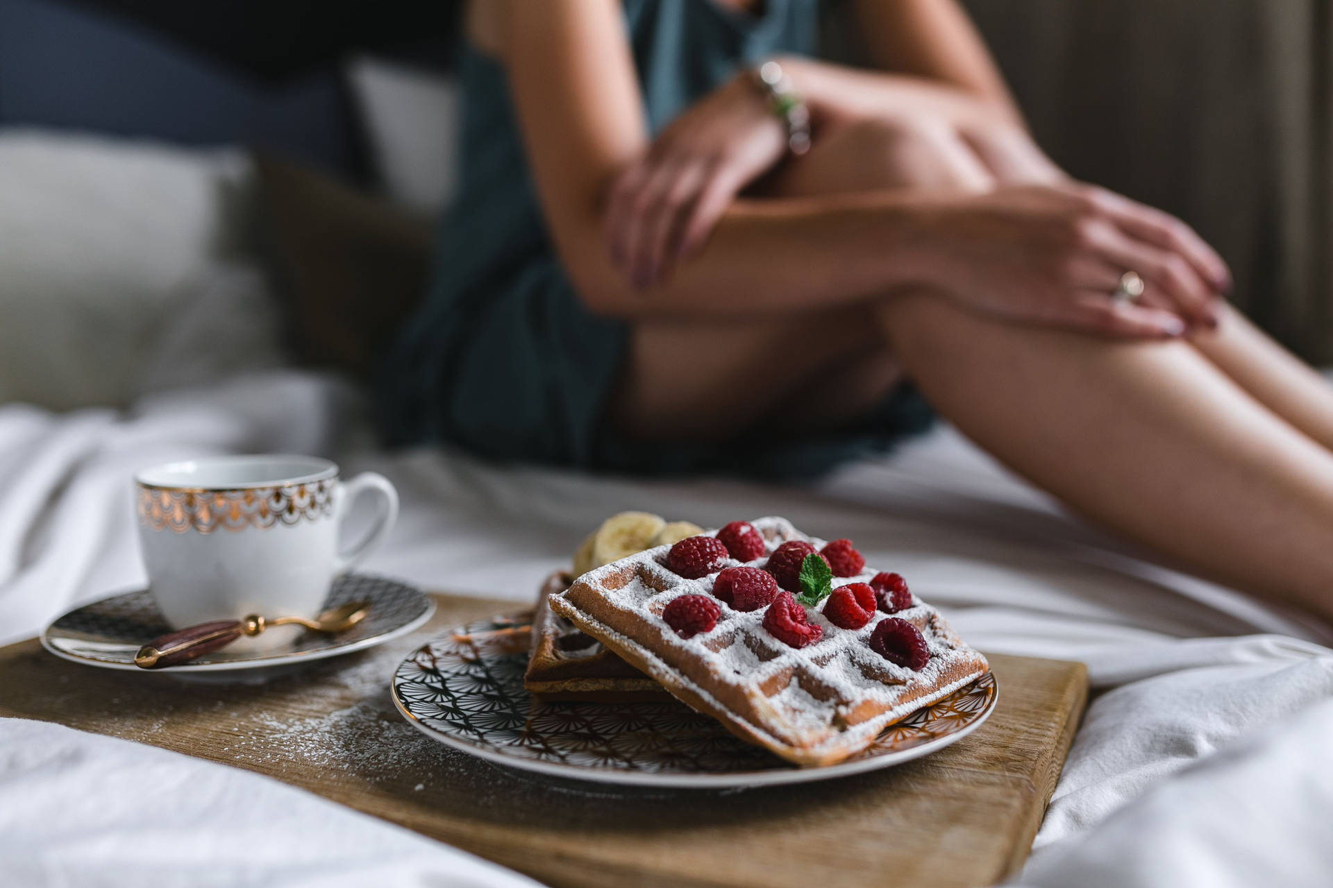 Caption: Crisp golden waffles served for a relaxing breakfast in bed Wallpaper