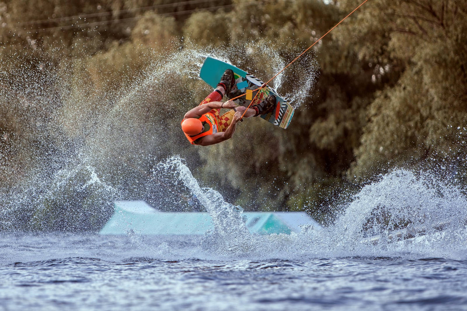 Mastering the Tootsie Roll Trick in Wakeboarding Wallpaper