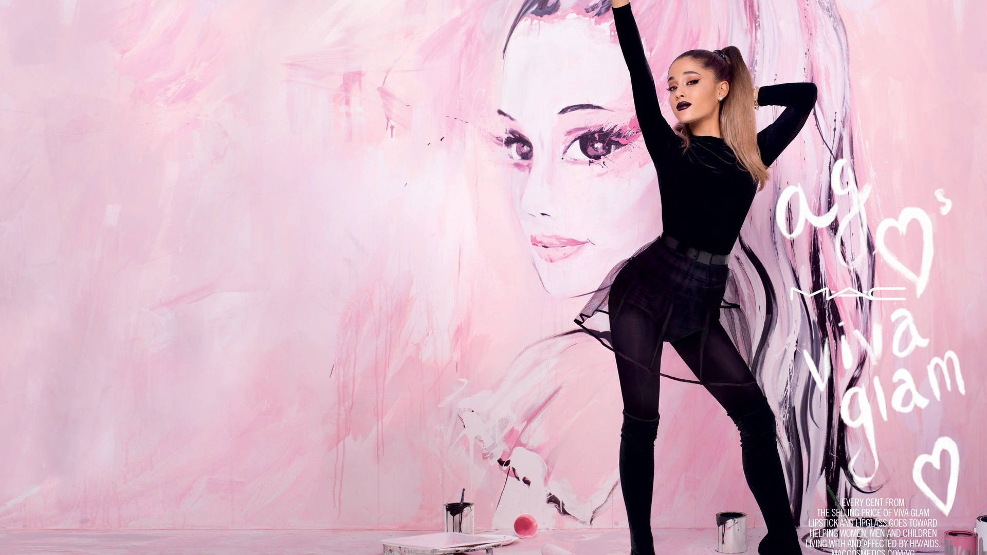 Ariana Grande slaying the stage Wallpaper