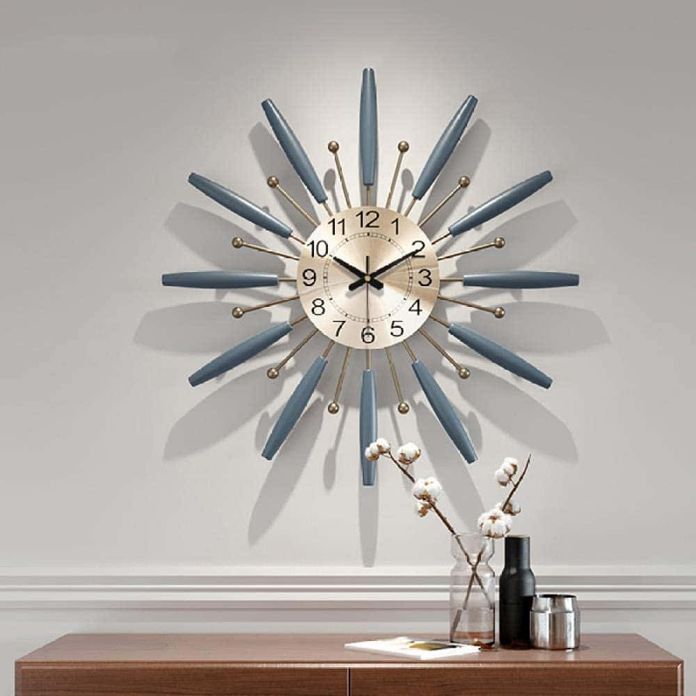 A Wall Clock With A Blue And Silver Design