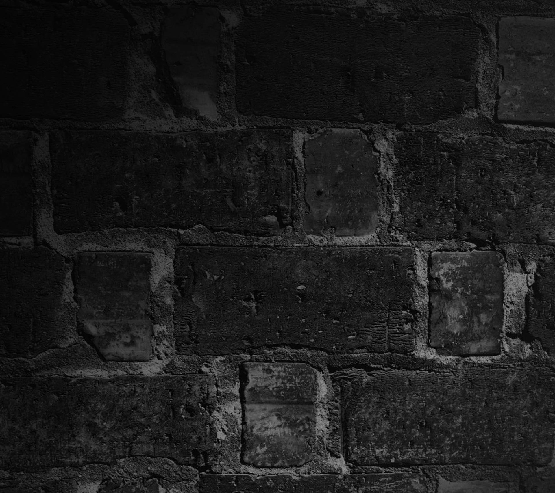 Wall Of Black Brick Pieces Wallpaper