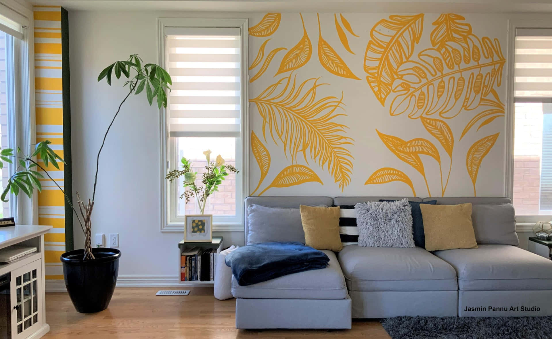 A Living Room With Yellow And Gray Walls