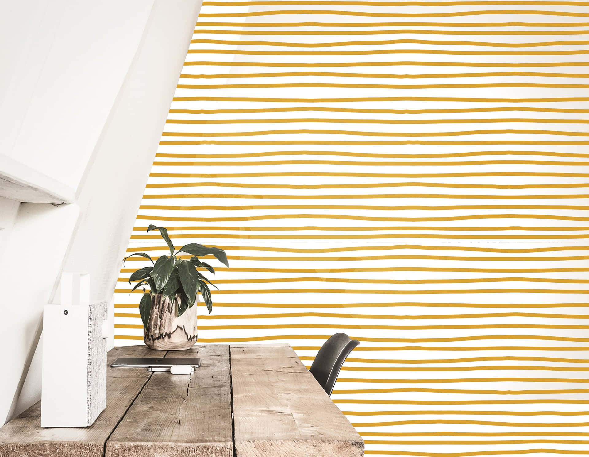 A Yellow And White Striped Wallpaper In A Room