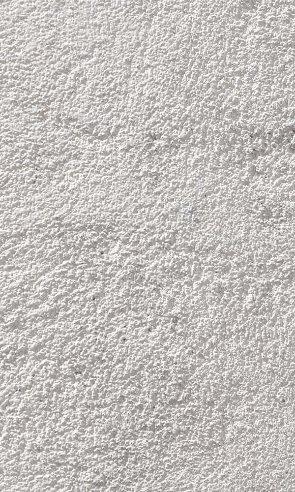 A Close Up Of A White Wall With A White Paint