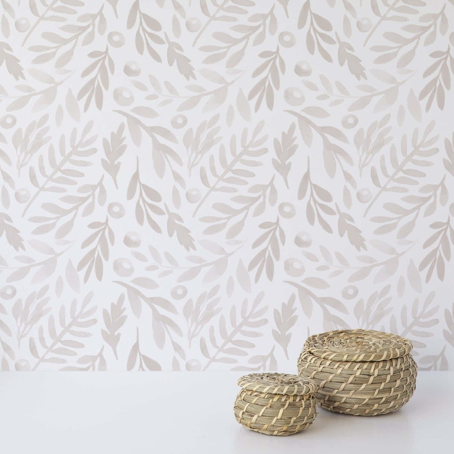 Wall With Subtle Leaf Decorations Wallpaper