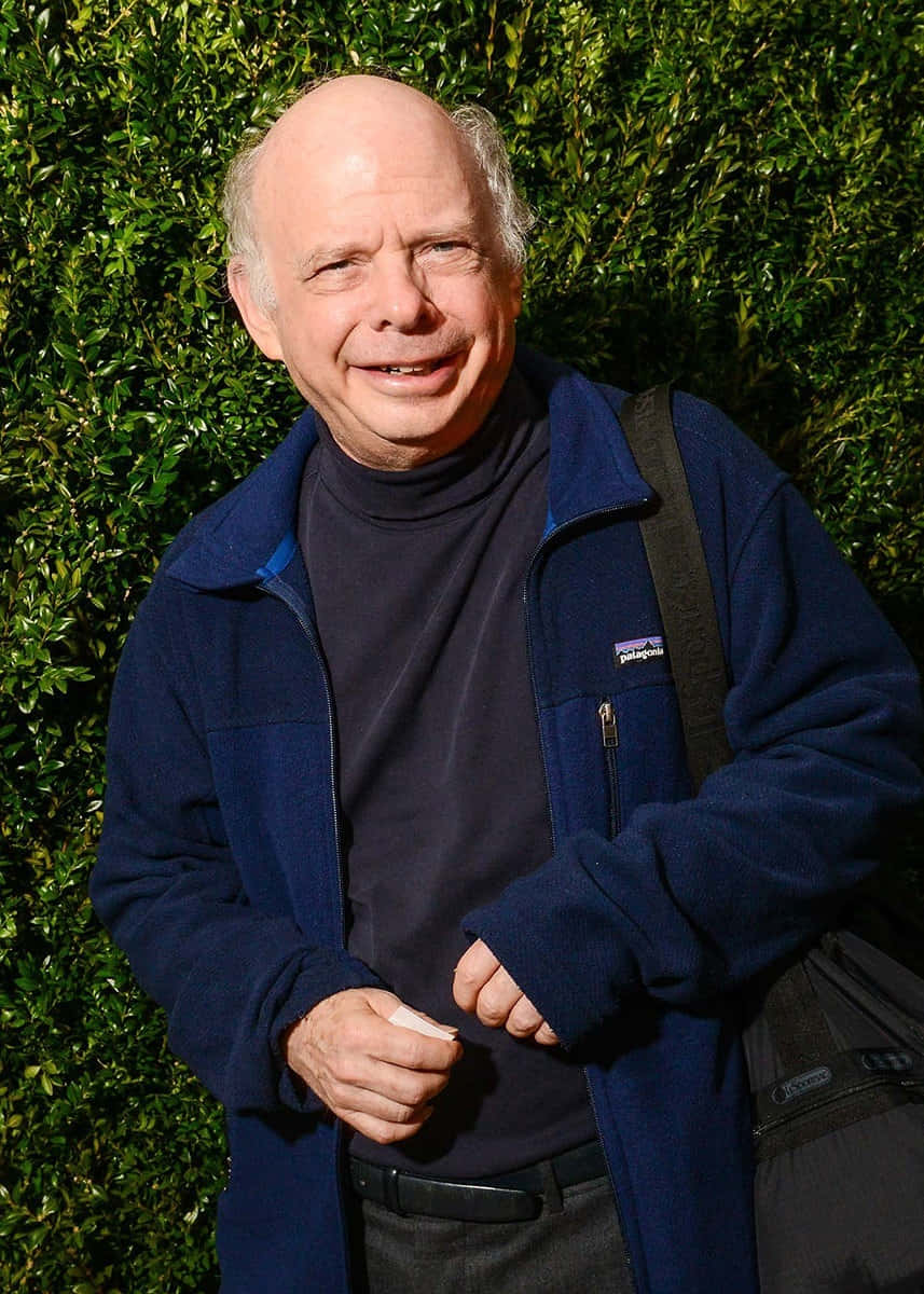 Wallace Shawn posing during an event Wallpaper