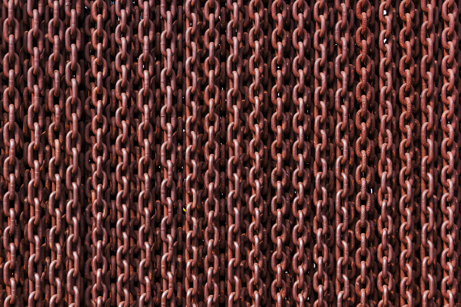 1.  Connecting Strength: Rusty Iron Links Wallpaper