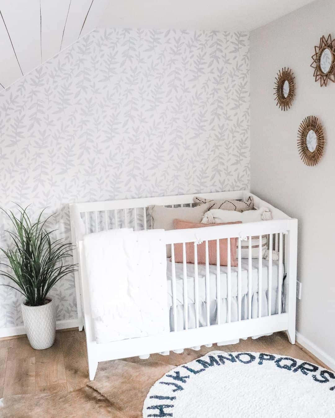 Walls Of A Baby Room With Subtle Designs Wallpaper