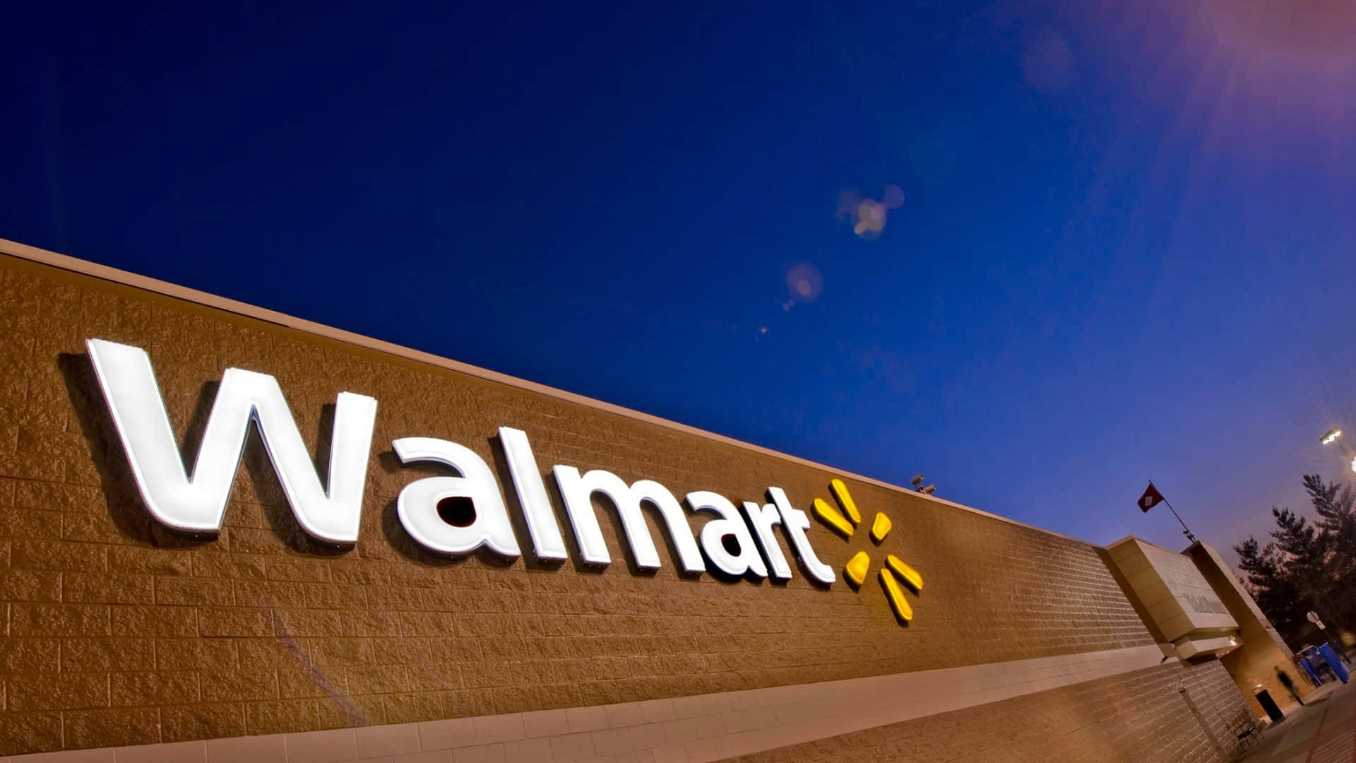 walmart's new logo is shown at night