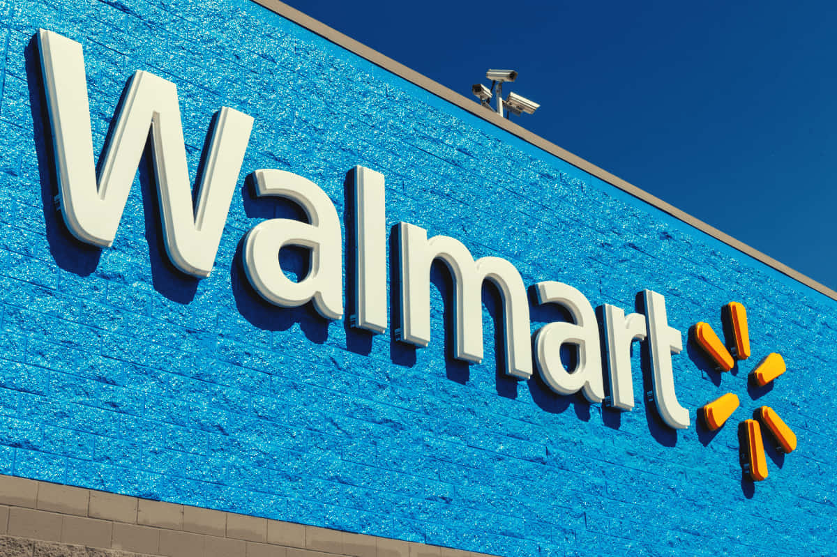 Umaplaca Azul Com A Palavra Walmart Escrita Nela