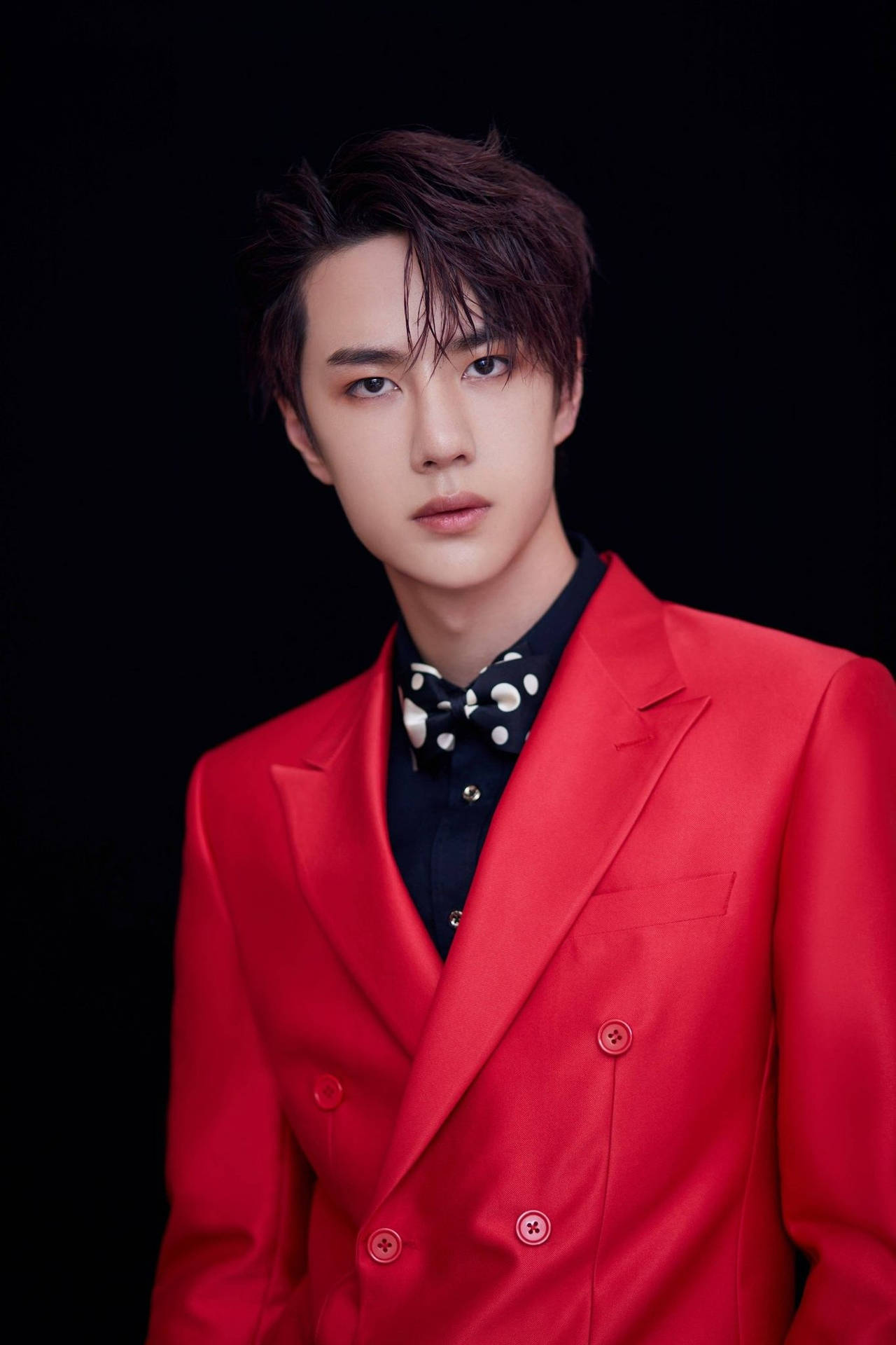 Chinese Actor Wang Yibo in a stunning red outfit on the set of Produce 101. Wallpaper