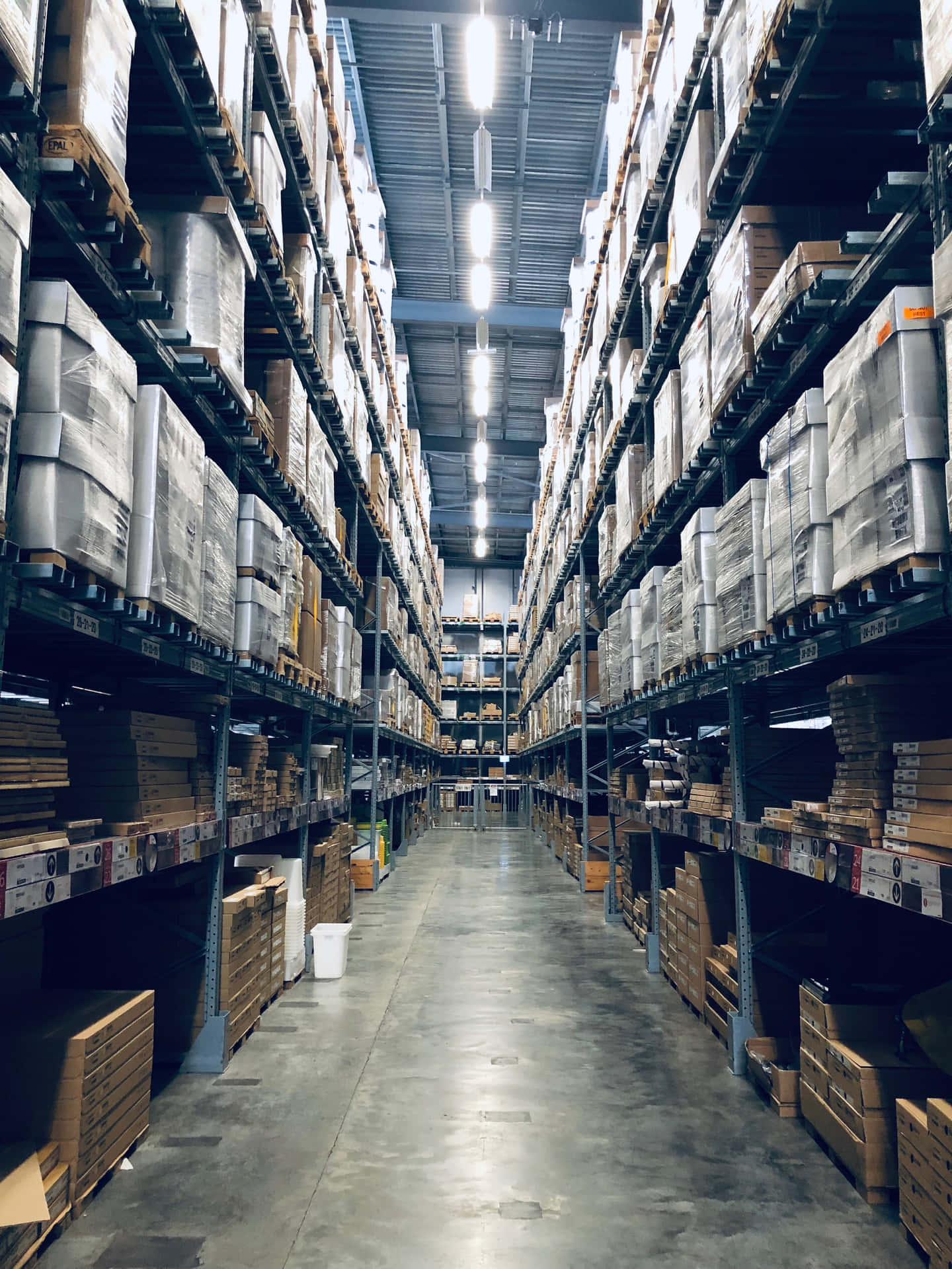 A Warehouse With Many Boxes And Boxes On The Shelves