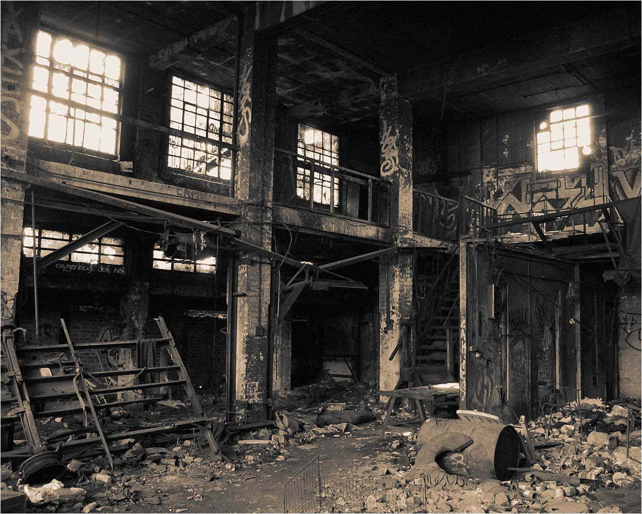 A Black And White Photo Of An Abandoned Factory