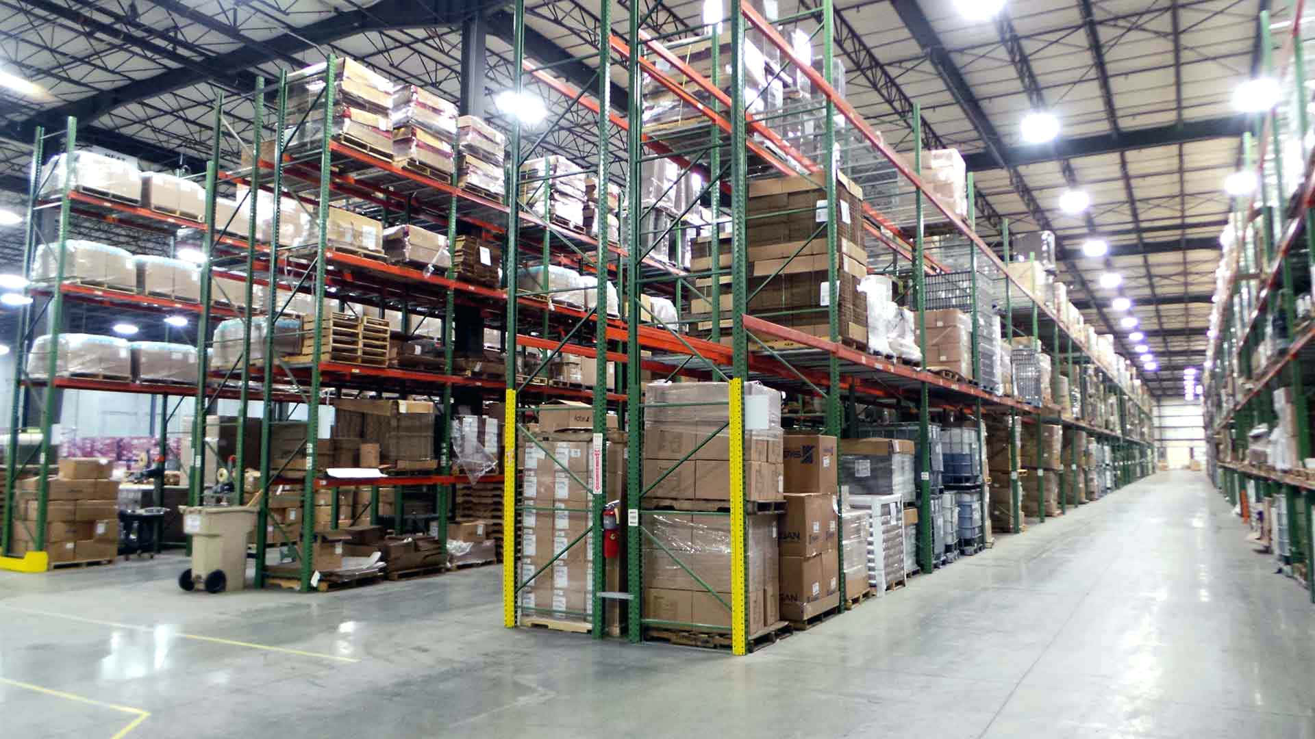 A Warehouse With Many Shelves And Boxes