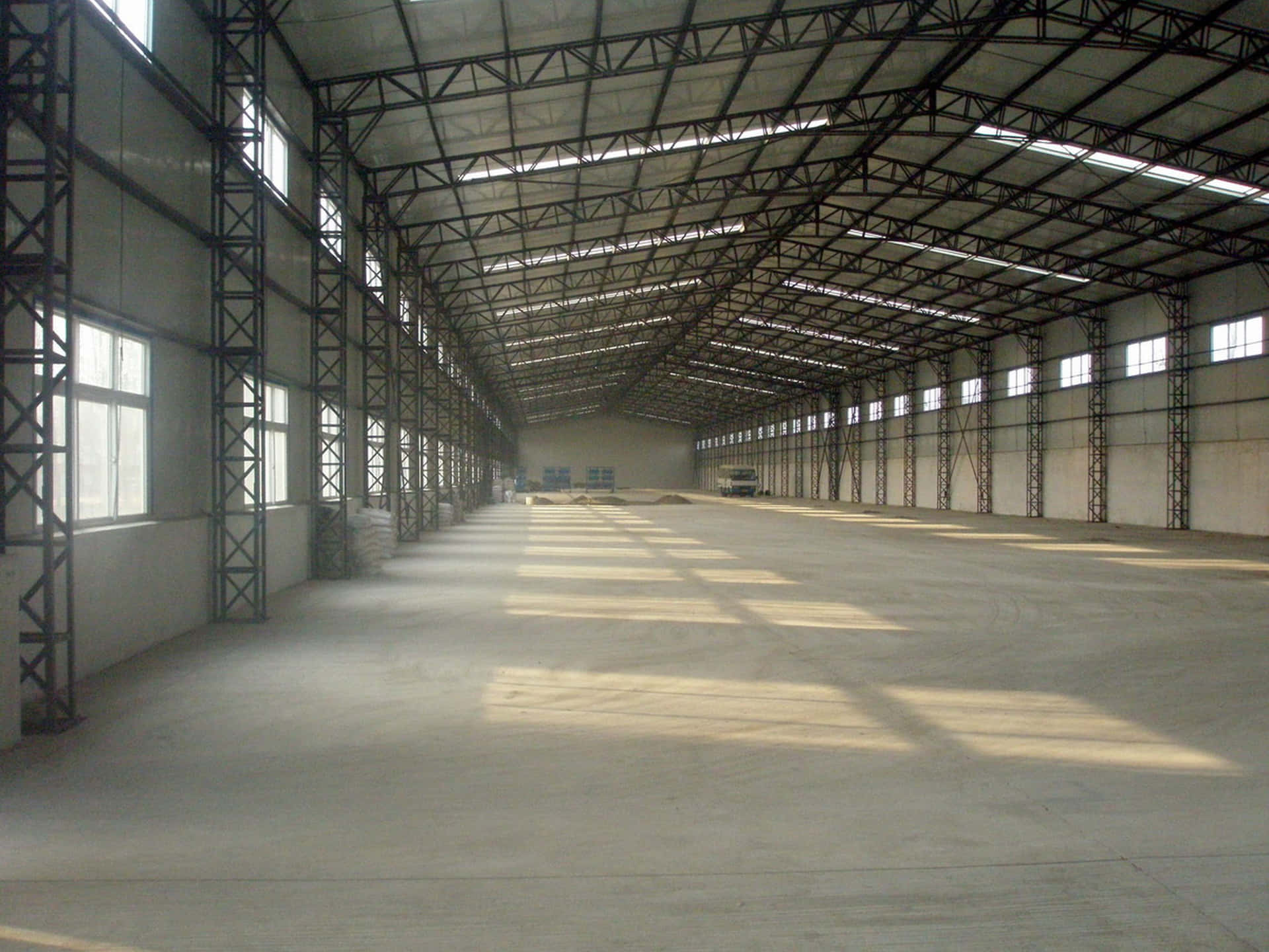 A Large Warehouse With A Large Open Space