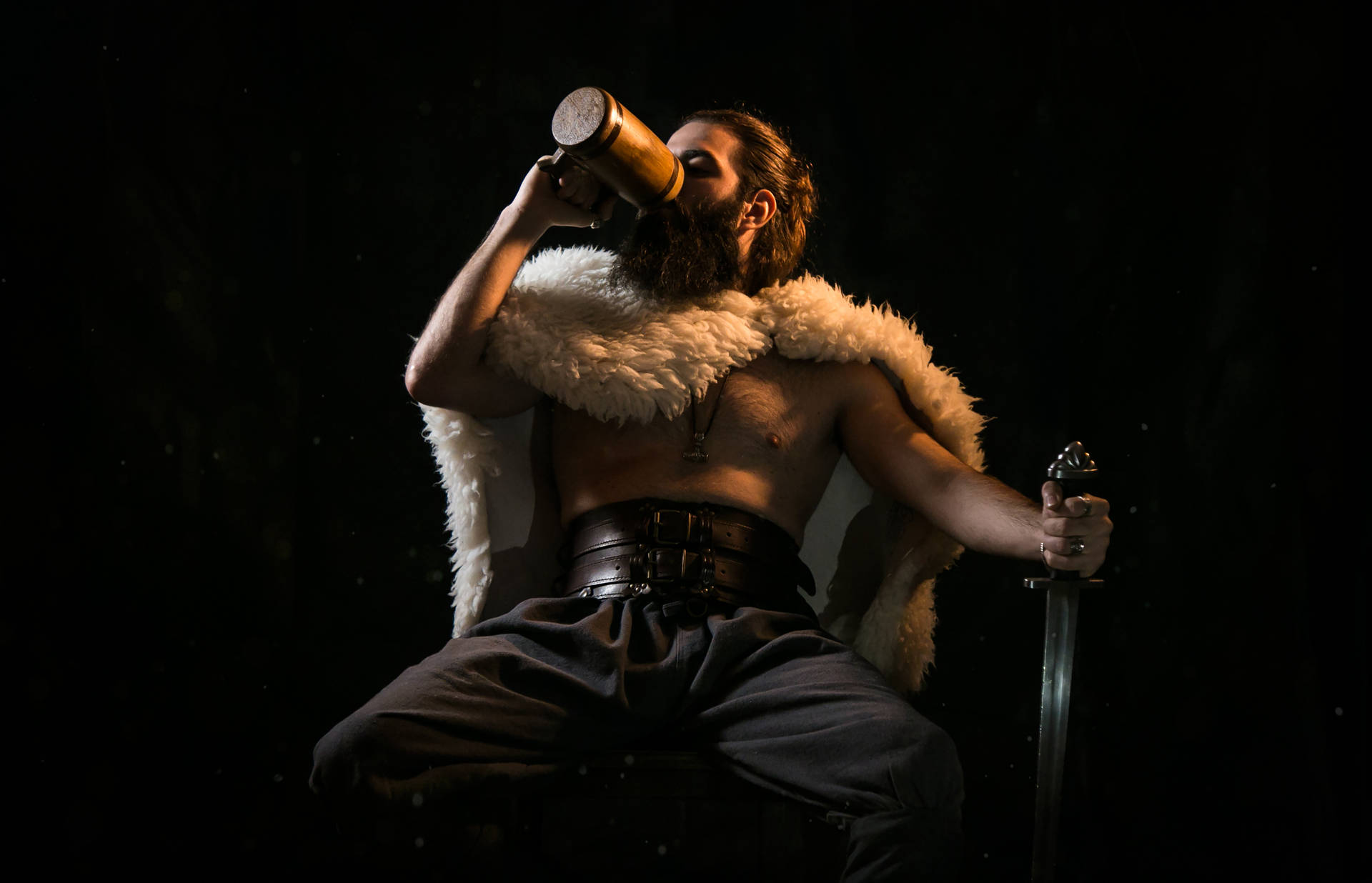 Warrior Drinking From Wooden Mug Background