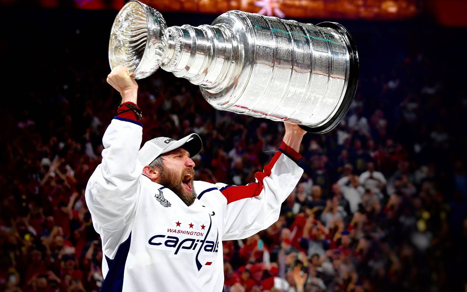 Alexander Ovechkin of the Washington Capitals Hoisting the Stanley Cup Wallpaper