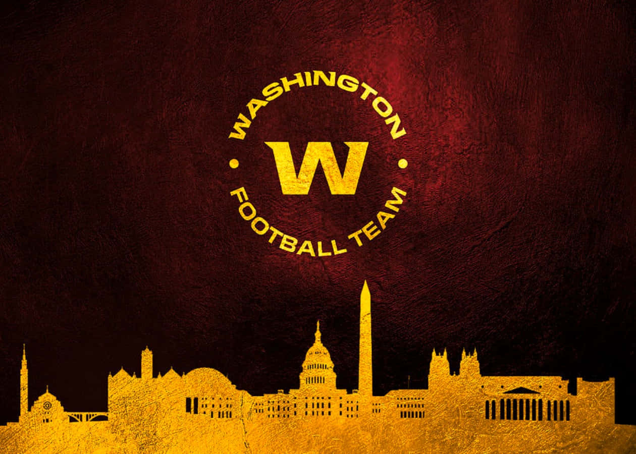 Washington Football Team in action on a vibrant stadium field Wallpaper