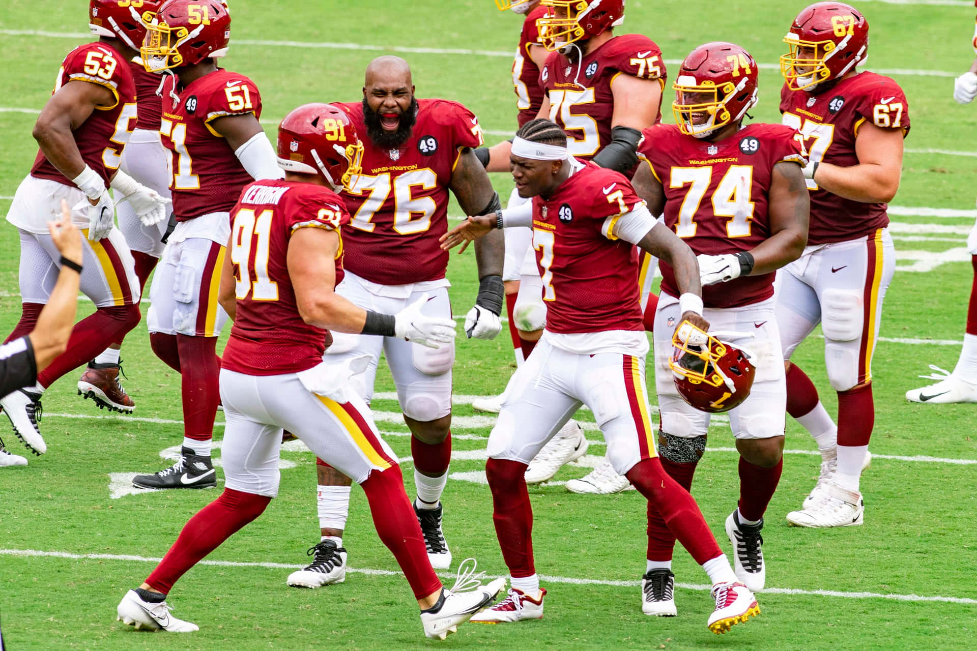 Washington Football Team I Aksjon Under En Kamp Bakgrunnsbildet