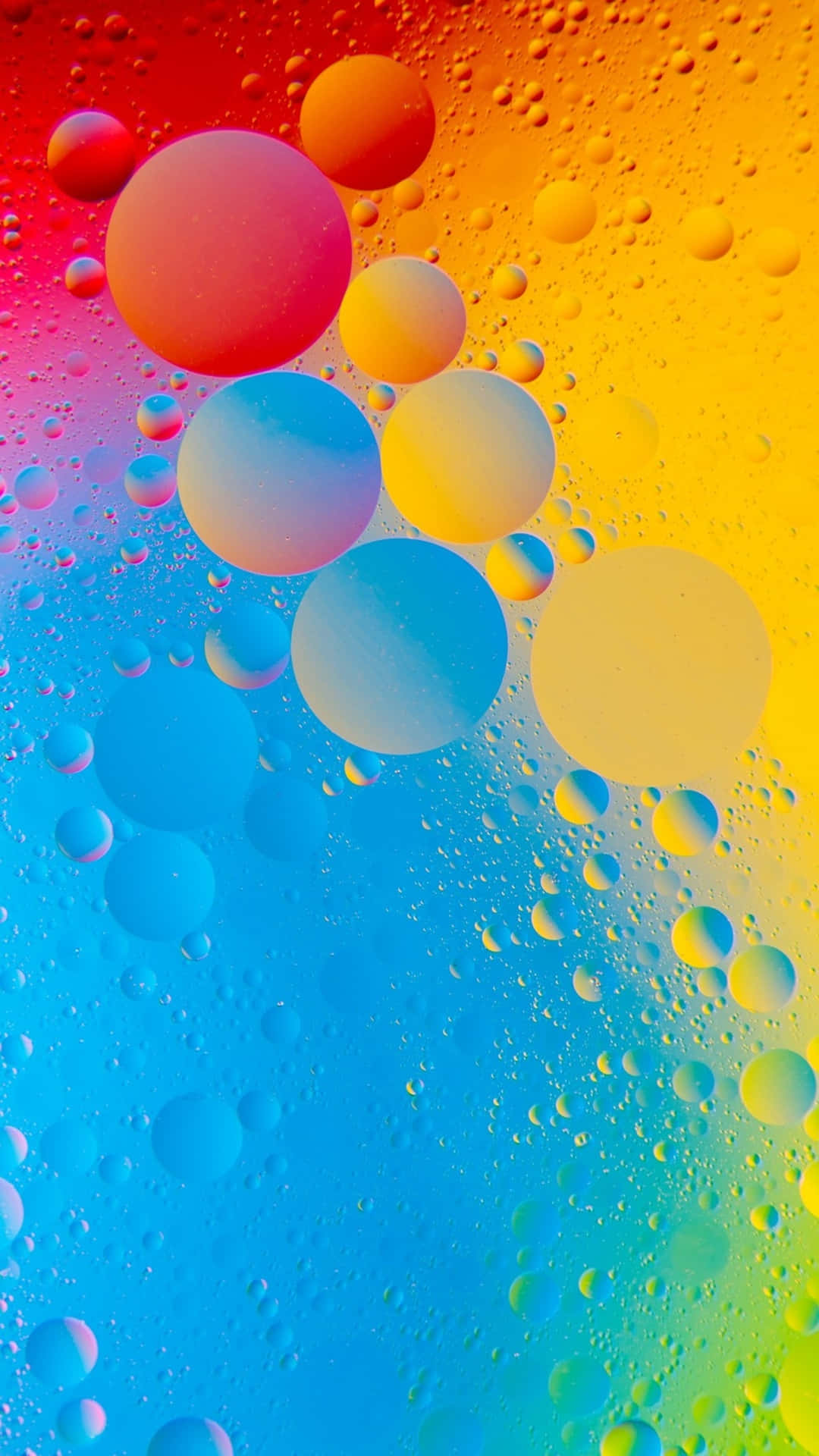 Magnificavista Di Un'arte Astratta A Gocce D'acqua Colorate In 4k Per Telefono. Sfondo