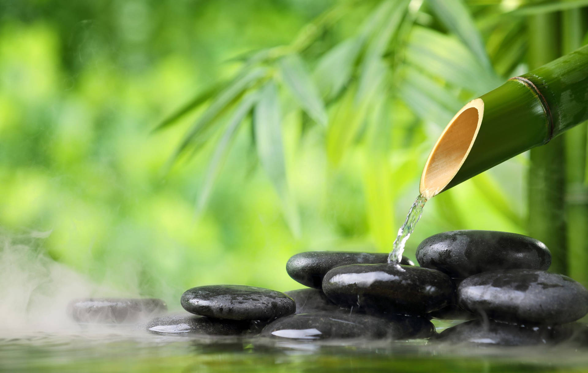 Water Streaming From Bamboo To Zen Stones Therapy Wallpaper